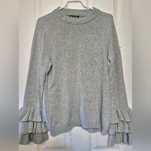 Karl Lagerfeld Size Large tiered bell sleeve sweater. In like new condition.
